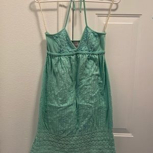 A surf shop, summer dress